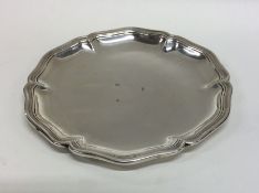 A heavy Continental circular silver waiter with re