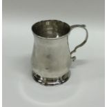 A miniature Georgian silver cup of baluster form.