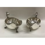 A pair of silver plated Georgian style sauce boats