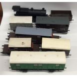 A collection of '0' gauge locomotives and rolling