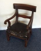 A Regency mahogany child's chair on spreading base