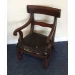 A Regency mahogany child's chair on spreading base