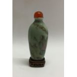 A Chinese miniature scent bottle decorated with fi
