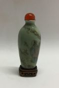 A Chinese miniature scent bottle decorated with fi