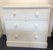 A pine chest of four drawers on plinth base. Est.