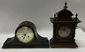An oak Nelson's hat clock together with one other.