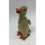 STEIFF A novelty toy duck with rotating head. Est.