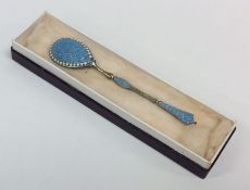An attractive silver gilt enamelled Russian spoon.