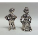 A pair of Continental silver pepperettes in the fo