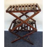 A pair of mahogany luggage racks. Est. £20 - £30.