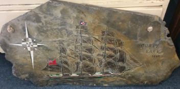A large slate plaque painted with 'The Cutty Sark'