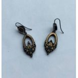 A pair of gold piqué drop earrings inset with flow
