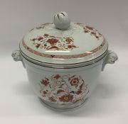 A Wedgwood ice bucket and cover with floral decora