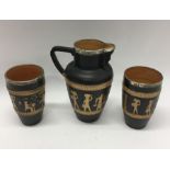 A Doulton Lambeth jug together with two matching b