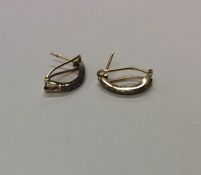 A pair of rose diamond and gold hoop ear clips. Ap