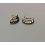 A pair of rose diamond and gold hoop ear clips. Ap