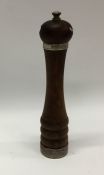 A tall silver mounted mahogany pepper grinder. Est