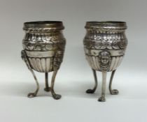 A good pair of Italian silver vases on three sprea