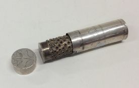 An unusual English 17th century silver cylindrical nutmeg g