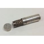 An unusual English 17th century silver cylindrical nutmeg g