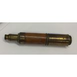An Antique brass mounted telescope. By Dolland of