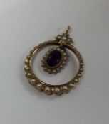 A late Victorian amethyst and pearl pendant with l