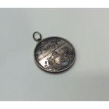 A heavy silver medallion for Curling. Approx. 26.7