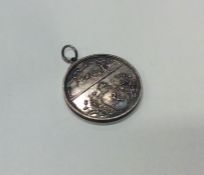 A heavy silver medallion for Curling. Approx. 26.7
