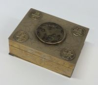 A Chinese brass box mounted with a hard stone plaq