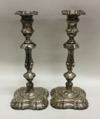 A tall pair of Adams' style silver candlesticks. S