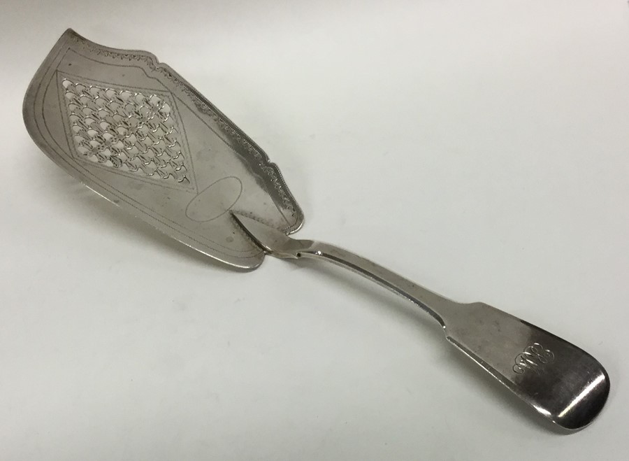 A Georgian silver fiddle pattern fish slice with p