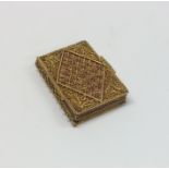 An early rare filigree needle case with ball and s