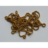 A 9 carat rope twist gold guard chain with ring cl
