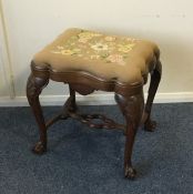 A Georgian style stool with slip-in seat and stret