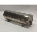 An unusual silver plated cylindrical serving dish