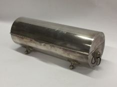An unusual silver plated cylindrical serving dish