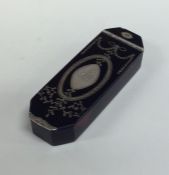 An attractive tortoiseshell and silver inlaid box