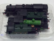 An '00' gauge Hornby GWR engine together with thre