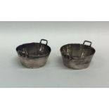 A pair of Victorian silver salts in the form of pa