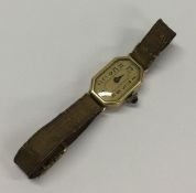 A lady's 18 carat gold cocktail watch. Approx. 8 g