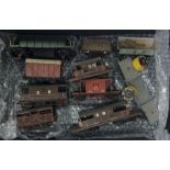 A collection of '00' gauge rolling stock. Est. £30