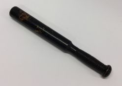 An Antique policeman's truncheon painted with a cr