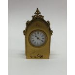 A French miniature brass mounted carriage clock wi