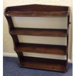 A mahogany tapering shelf with reeded sides. Est.