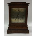 A good mahogany mantle clock with silvered dial an