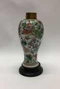 A tall baluster shaped 19th Century Chinese vase d
