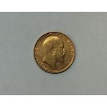 A 1907 half sovereign. Est. £100 - £150.