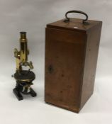 A good mahogany cased microscope. By Carl Zeiss. E