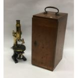 A good mahogany cased microscope. By Carl Zeiss. E