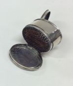 An oval Georgian silver hinged top nutmeg grater.